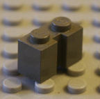 Dark old grey Lego brick.