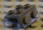 Dark old grey Lego part.