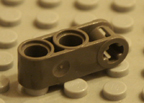 Dark old grey Technic Lego part.