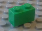 Bright green Lego brick part